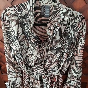 Blouse with sheer animal print fabric.